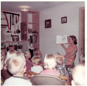 Mrs. Julius Behling Jr. reading during Story Hour. - September 1969
